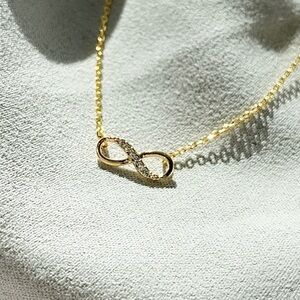 Infinity Crystal Gold Toned Necklace